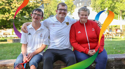 Zwei Athleten und eine Athletin von Special Olymics im Saarland